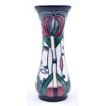 Moorcroft Pottery: A Moorcroft 'Mackintosh Rose' vase designed by Rachel Bishop. Height approx 13cm.