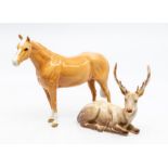 A Beswick horse and Beswick deer