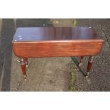 A Victorian style mahogany Pembroke table, fitted with a single drawer, measuring 119cm high, 73cm