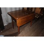 A Victorian oak Pembroke table, raised on octagonal sectioned legs, measuring 100cm long, 77cm high,