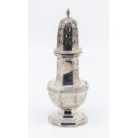 An Edwardian silver octagonal caster, the domed detachable cover with pierced decoration and