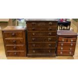 A Victorian burr walnut sewing table top, rectangular with canted corners, opening to reveal