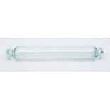 A hand blown glass rolling pin