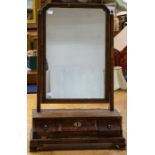 A George I burr walnut veneered toilet mirror, circa 1720, rectangular with canted corners, side