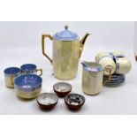 A 1920's German tea set by RW, along with three Saki cups