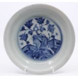 A Nanking style shipwreck dish with blue and white pattern, signed to the base