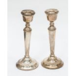 A pair of Elizabeth II silver candlesticks, by FH, Birmingham, 1973, filled (2)