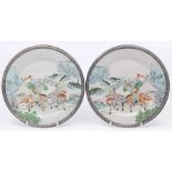 A pair of Chinese porcelain plates with silvered bellflower cast rims