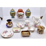 A collection of Royal Crown Derby, comprising a pair of blue ground vases and covers, a 1128 Imari