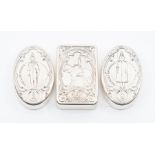 Militaria Interest: A collection of two sterling silver stamped 925/1000 oval pill boxes and covers,
