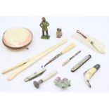 A collectors lot to include; shell purse, ivory glove stretchers, fruit knives, thistle brooch and