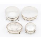 A collection of four various early 20th Century silver ring boxes and covers, various dates and