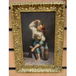 An early 20th Century oil on panel depicting a young man eating, unsigned, fitted in a gilt frame,