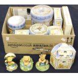 A collection of Rambling Ted figures in boxes and tins