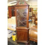 An Edwardian mahogany two-tier floor standing corner cabinet, raised on bracket feet, 98cm high,