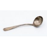A George V silver Hanovarian with rat tail sauce ladle, crest engraved to reverse handle, London,
