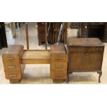 An Art Deco oak dressing table, circa 1930, fitted with six small drawers and a central drawer,