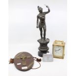 An early 20th Century spelter figure mantle clock, 1950's desk lighter and a religious plaque (3)