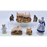 Three boxed Lilliput Lane cottages, Beatrix Potter Tom Kitten, two Goebel rabbits and a Dutch