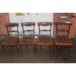A harlequin set of four Victorian chairs, comprising three early Victorian rosewood side chairs,