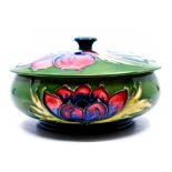 Moorcroft Pottery: A Moorcroft 'Anemone' pattern powder bowl and cover. Height approx 7cm. Impressed