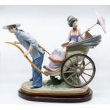 Lladro figure of Chinese girl being pulled in a carriage by Chinese taxi man, on stand