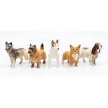 Five Beswick miniature dogs