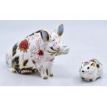Boxed Royal Crown Derby money pig with gold stopper, along with boxed Royal Crown Derby boxed bank