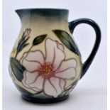 Moorcroft Pottery: A Moorcroft Limited Edition 'Hibiscus Moon' jug designed by Sian Leeper. Height