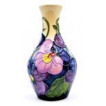 Moorcroft Pottery: A Moorcroft numbered edition vase designed by Rachel Bishop. Height approx 13.