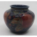 A Moorcroft small ovoid vase, Pomegranate pattern, impressed marks to base, approx 7cm high
