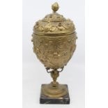 Gilt and jewelled chalice on marble stand with classical and renaissance design *** Provenance: from