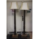 A pair of Georgian style mahogany standard lamps, having spiral twist columns, 72cm high (2)