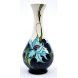 Moorcroft Pottery: A Moorcroft 'Sea Holly' vase designed by Emma Bossons. Height approx 16.5cm.