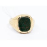 A 9ct gold and bloodstone signet ring, comprising a cushion shaped stone, size O1/2, total gross