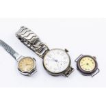A 1920's trench watch, white metal, along with two early 20th Century ladies wristwatches