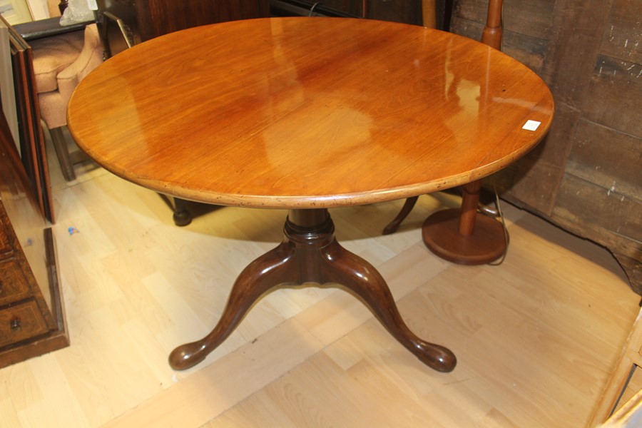 A 19th Century and later tilt top tripod table, fitted with an oval top, raised on a two part turned - Image 3 of 3