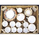 A collection of Royal Crown Derby tea and coffee cups, cans and saucers, including 2451, A1297,