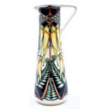 Moorcroft Pottery: A Moorcroft 'Kowkhai Flower' pattern tall slender jug designed by Philip