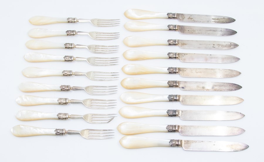 A Victorian set of 10 fruit knives and 9 fruit forks, silver blade and tines, acanthus collars and