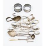 A collection of silver to include mixed flat ware mainly teaspoons and two napkin rings, various