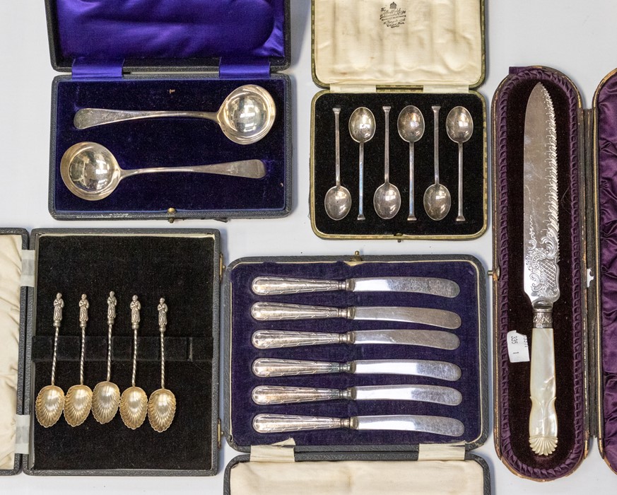 A collection of silver and plate flatware to include: A set of 6 silver teaspoons, cased A pair of