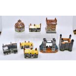 A collection of eight castle cottages, hand made and hand painted