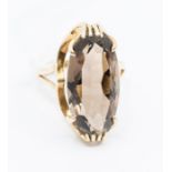 A smoky quartz and 9ct gold cocktail ring, the elongated stone approx 23 x 12mm, claw set in a fancy