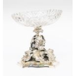 A Victorian style plated table centre piece, leaves on a tripod base, cut glass bowl, all pieces are