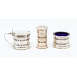 A Georgian style three piece silver condiment set to include: salt, pepper and mustard pot &