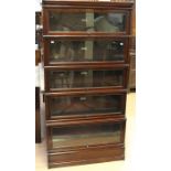 An early 20th Century Globe Wernicke mahogany stacking bookcase, five tier form, each side bearing a