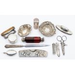 A collection of dressing table silver to include: two ring dishes, Scissors on suspension chain,