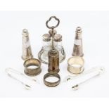 A collection of silver table ware to include:  a pair of Modern tapering salt and pepper pots, by