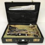 A mid 20th Century cased Imperial Clarinet, and an ebony Boosey & Hawkes of London AF C R: 10cm